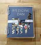 Medicine Dan - mixed media Artist's book by Ayin Es: inside Plexiglass box.