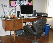 Mixed media artist, Ayin Es, rubber soul studio, office desk and chair