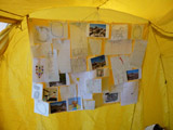Camp Up To Now installation by Ayin Es, interior tent with field notes and preliminary drawings