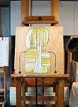 Mixed media artist, Ayin Es, rubber soul studio birch panel painting drying on easel